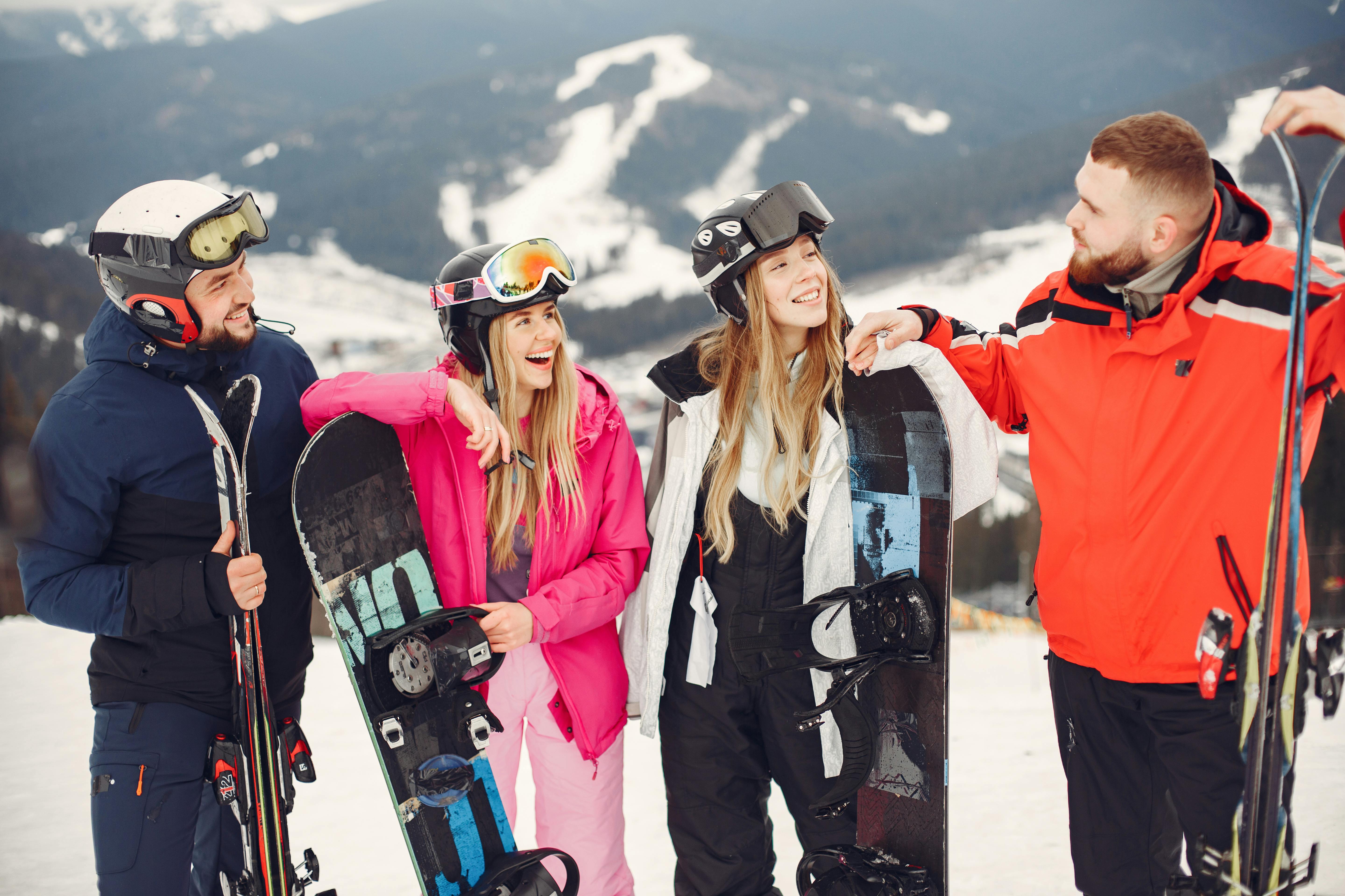 Students chatting with snowboards